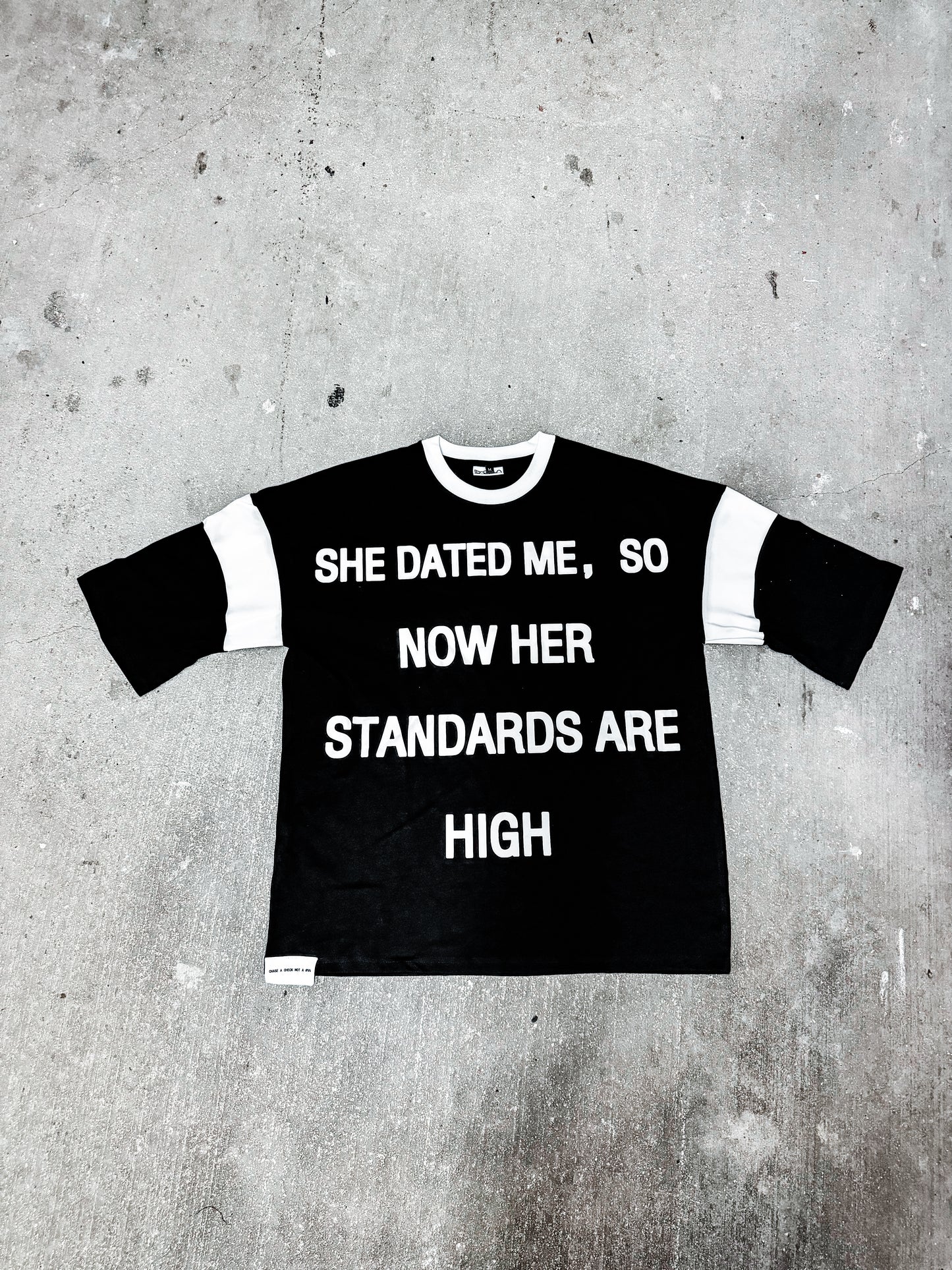 “SHE DATED ME, SO NOW HER STANDARDS ARE HIGH” OVERSIZED- TEES BLACK/WHITE