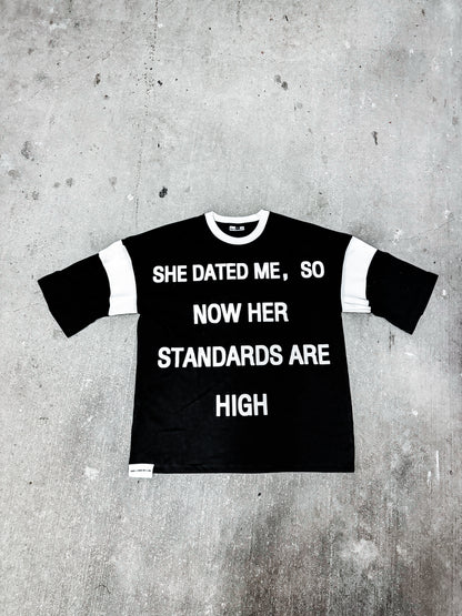 “SHE DATED ME, SO NOW HER STANDARDS ARE HIGH” OVERSIZED- TEES BLACK/WHITE